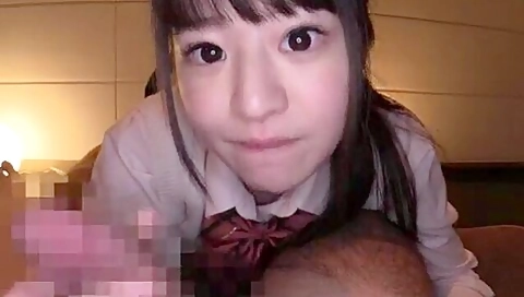 She shows off her cute tits, spreads her legs, and shows off her panties as she gives a hand job.